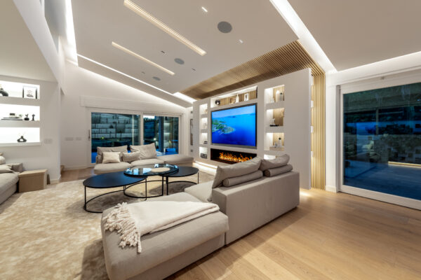 Living room view with Flexform sofa and custom-made boiserie